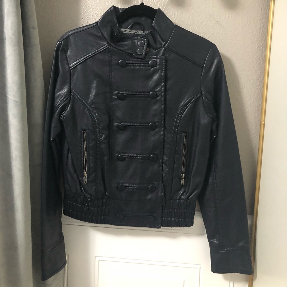 Navy blue faux leather coat.